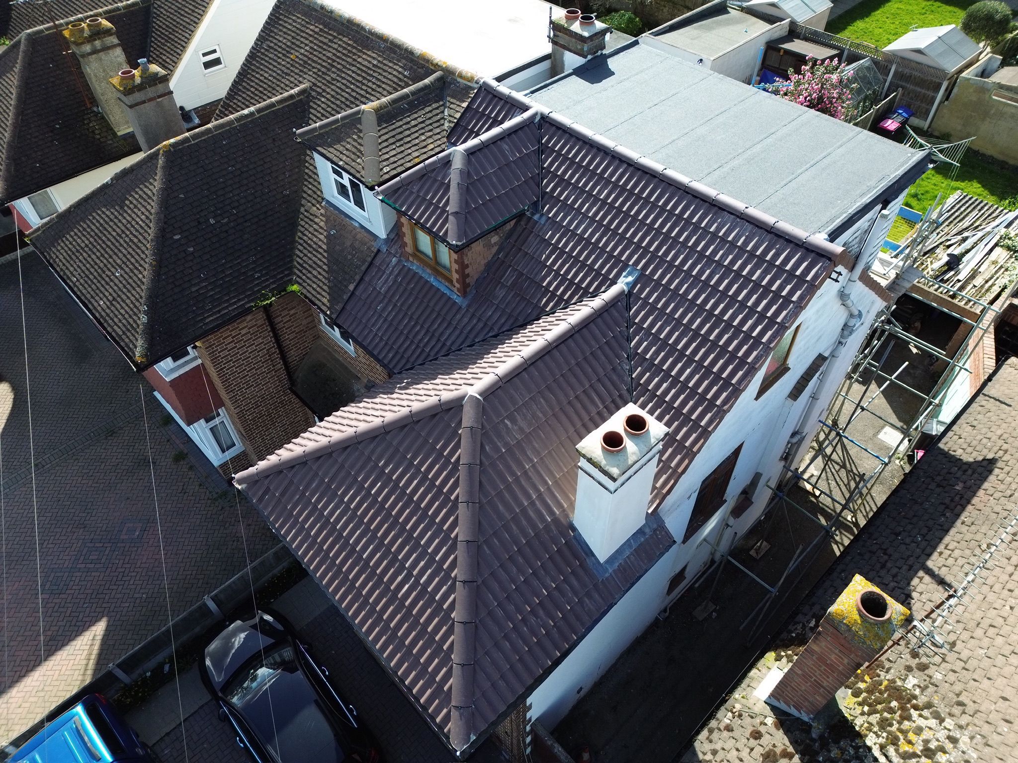 New brown interlocking tile roof with dormer