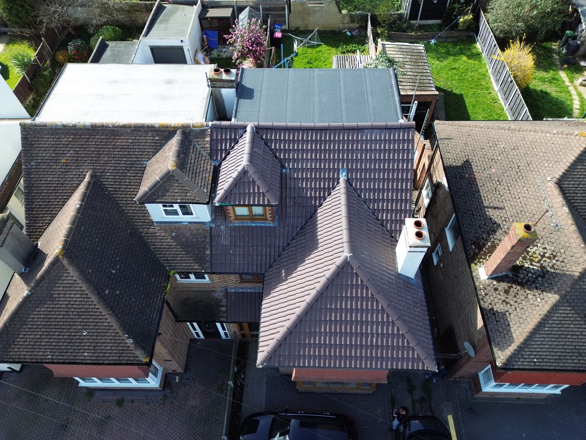 Re-tiled bungalow roof with skylights